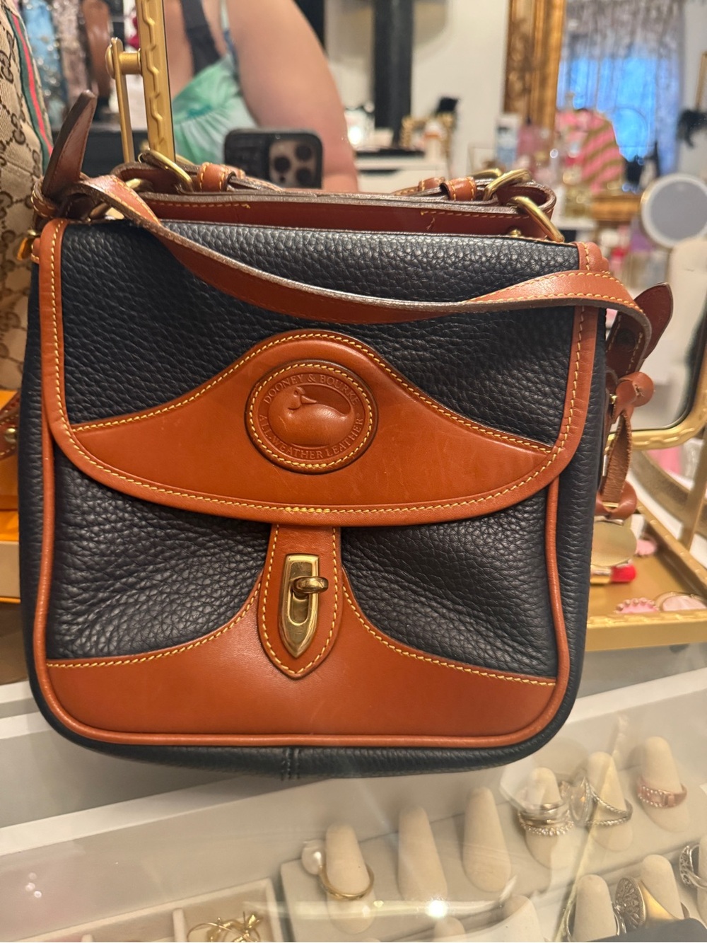 Dooney & Bourke Black Pebbled Leather Crossbody with Brown Trim